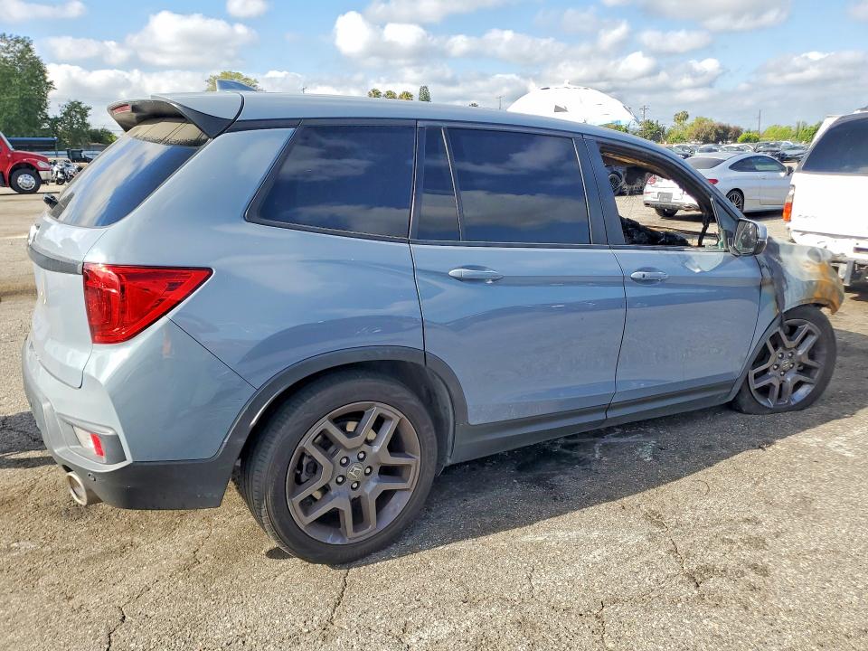 Photo 3 from auction – 2022 HONDA PASSPORT with VIN 5FNYF7H55NB002765