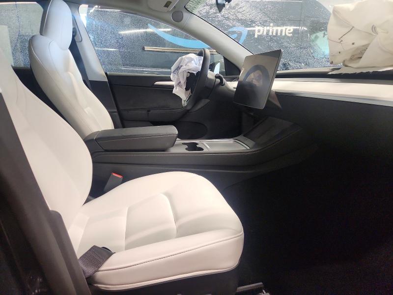 Photo 10 from auction – 2023 TESLA MODEL Y with VIN 7SAYGDEE2PF610247