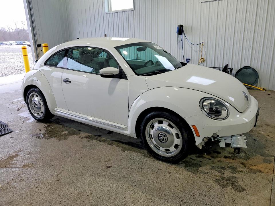 Photo 4 from auction – 2015 VOLKSWAGEN BEETLE with VIN 3VWF17AT8FM653350