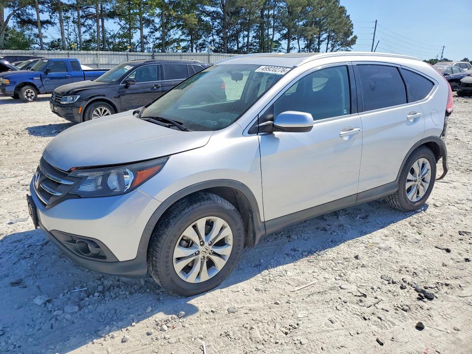 Photo 1 from auction – 2014 HONDA CR-V with VIN 2HKRM3H70EH553028