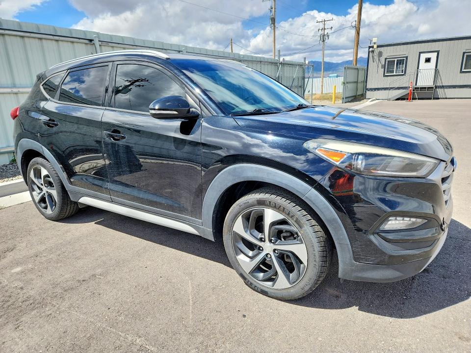 Photo 4 from auction – 2017 HYUNDAI TUCSON with VIN KM8J3CA22HU447605