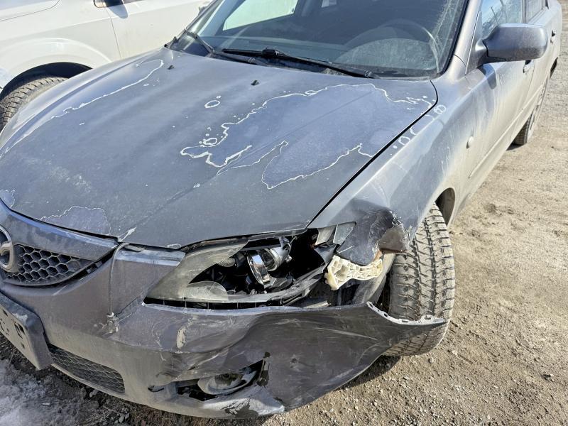 Photo 2 from auction – 2007 MAZDA 3 with VIN JM1BK32F071720019