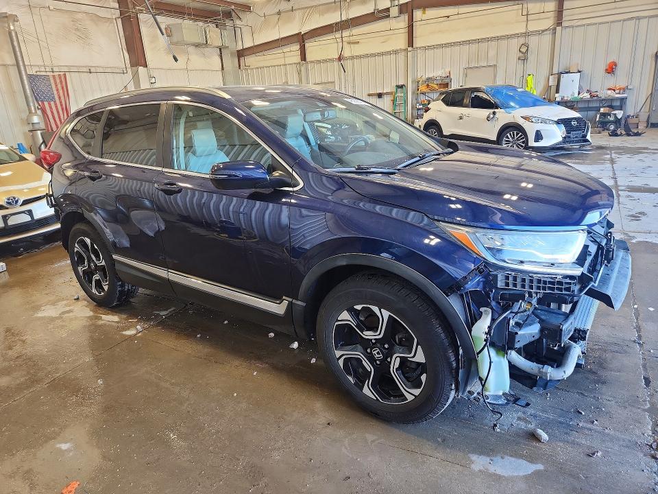 Photo 4 from auction – 2019 HONDA CR-V with VIN 7FARW2H99KE013911
