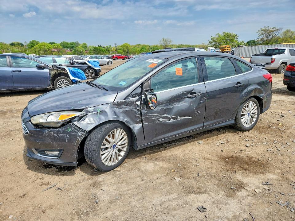 FORD FOCUS 2017 with VIN 1FADP3J23HL238441 - Photo from auction