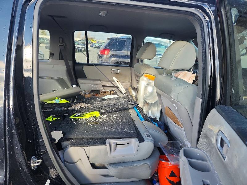 Photo 11 from auction – 2014 HONDA PILOT with VIN 5FNYF4H48EB047186
