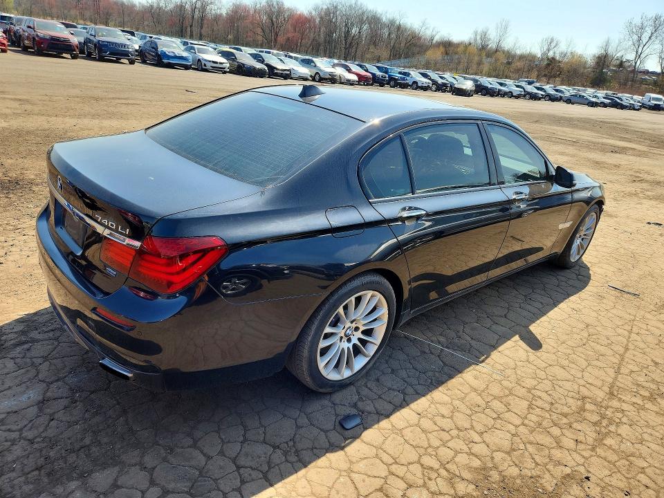 Photo 3 from auction – 2014 BMW 740 with VIN WBAYF4C58ED282191