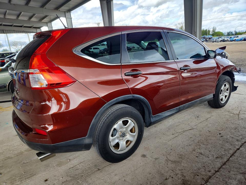 Photo 3 from auction – 2015 HONDA CR-V with VIN 2HKRM3H36FH510490