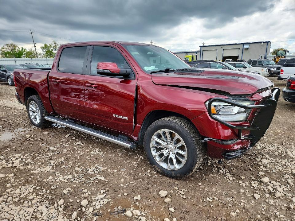 Photo 4 from auction – 2023 RAM 1500 with VIN 1C6SRFJT4PN621076
