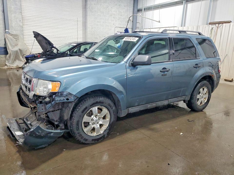 FORD ESCAPE 2011 with VIN 1FMCU0D79BKA33395 - Photo from auction