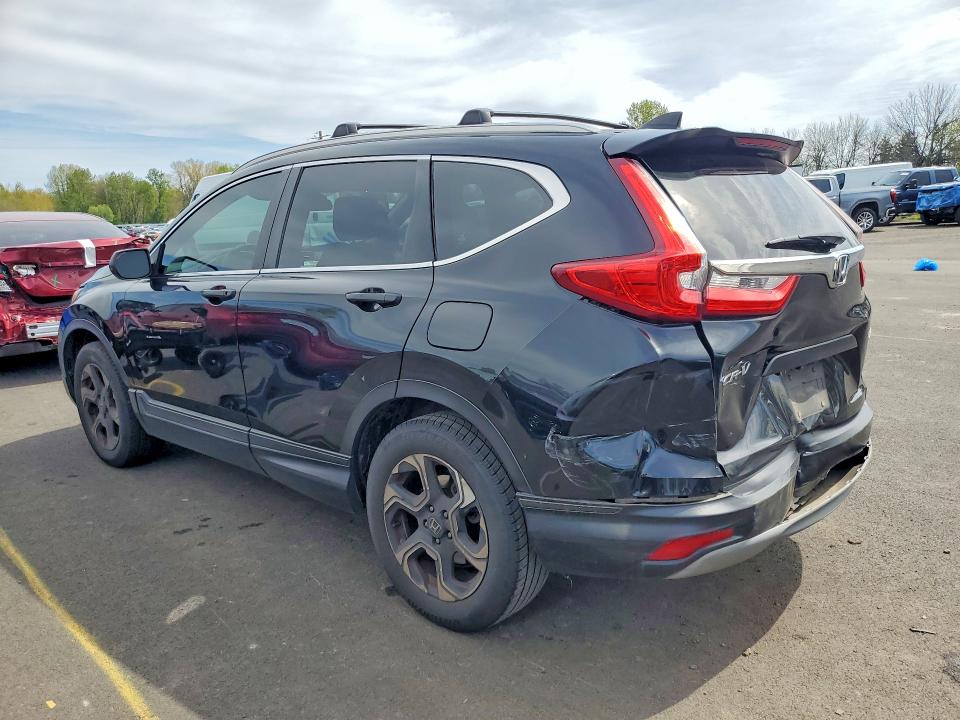 Photo 2 from auction – 2017 HONDA CR-V with VIN 2HKRW6H31HH210516