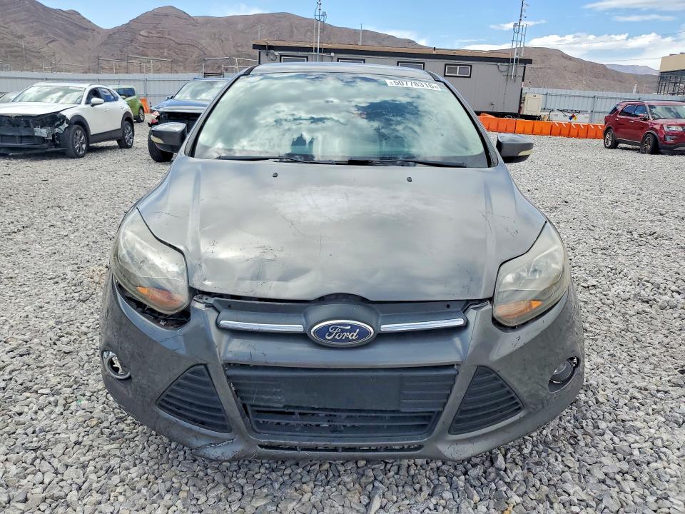Photo 5 from auction – 2012 FORD FOCUS with VIN 1FAHP3M24CL373708