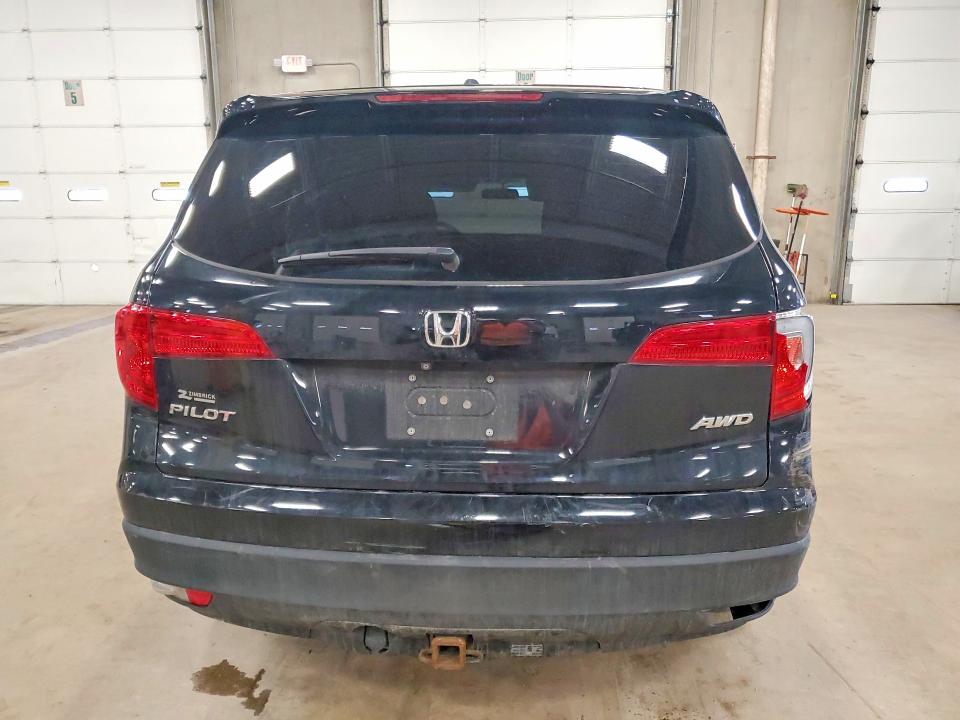 Фото 6 с аукциона – 2016 HONDA PILOT с VIN 5FNYF6H30GB081760
