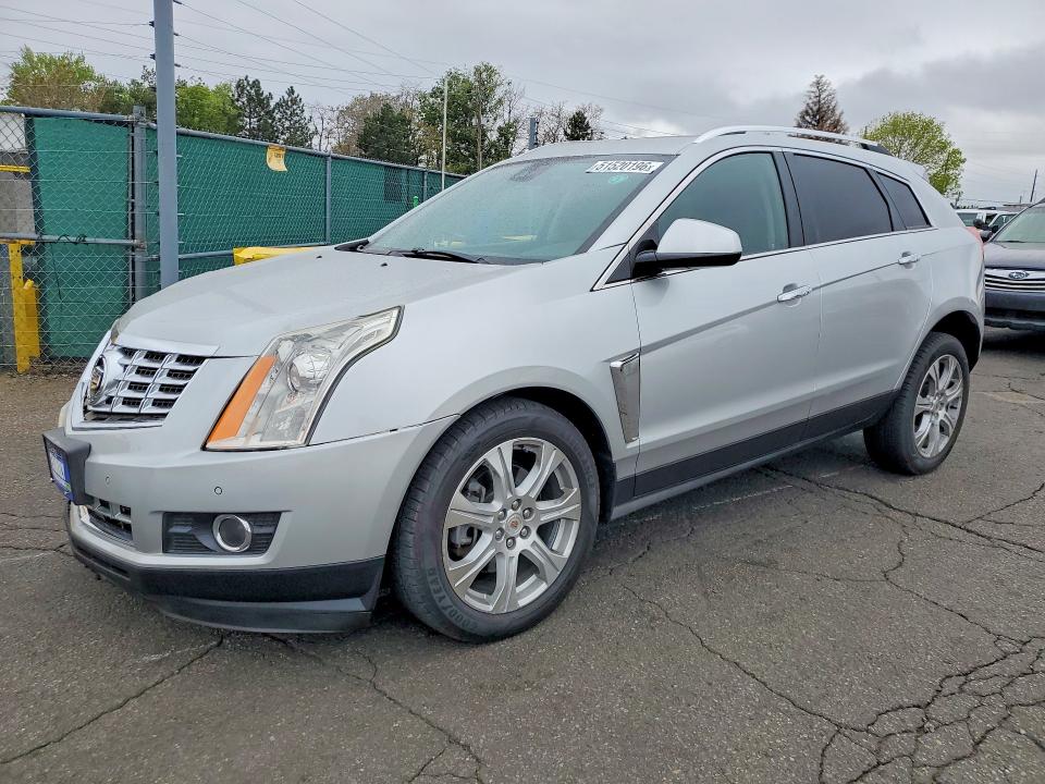 CADILLAC SRX 2015 with VIN 3GYFNGE31FS593905 - Photo from auction