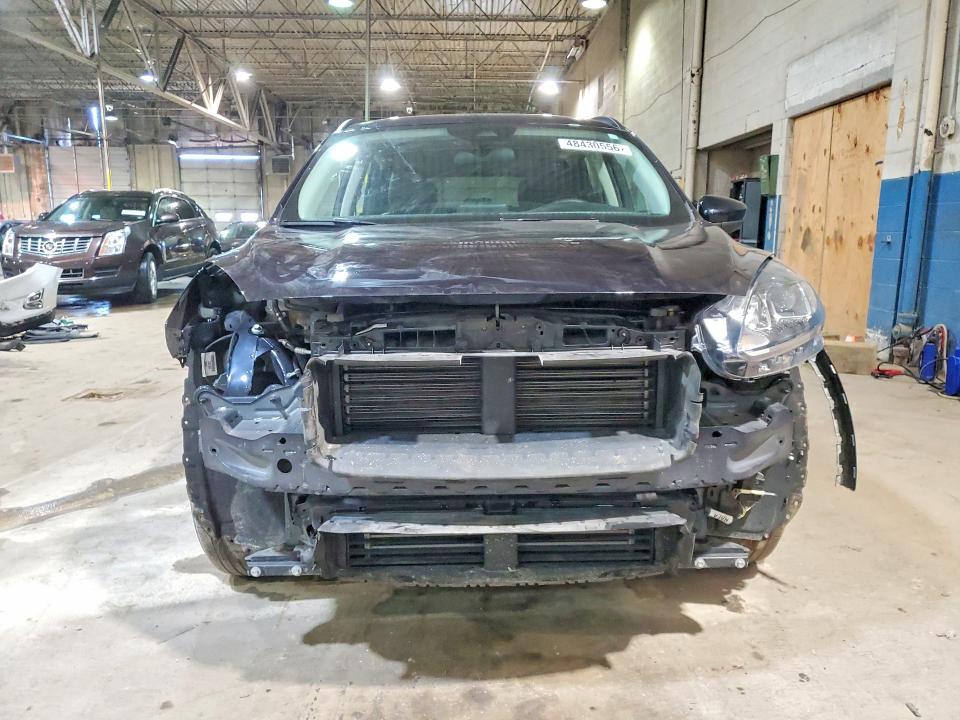 Photo 5 from auction – 2021 FORD ESCAPE with VIN 1FMCU9H60MUA86404