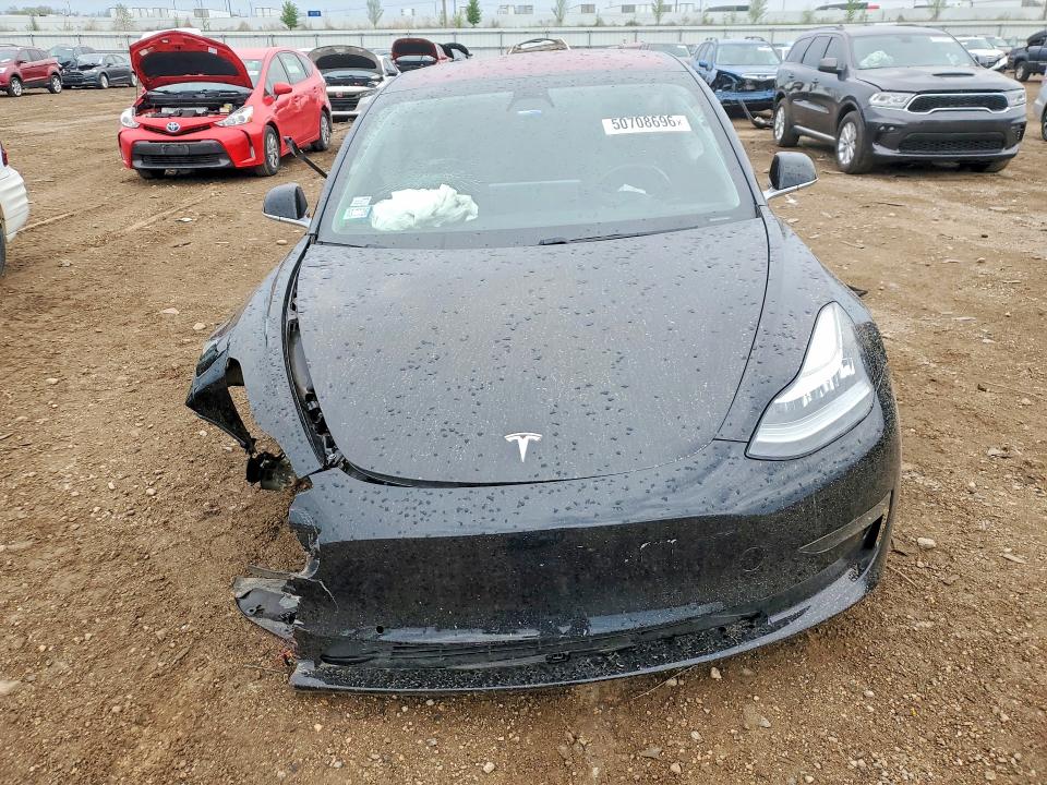 Photo 5 from auction – 2018 TESLA MODEL 3 with VIN 5YJ3E1EA4JF020860