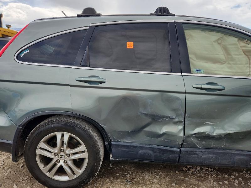 Photo 10 from auction – 2011 HONDA CR-V with VIN JHLRE4H77BC035382