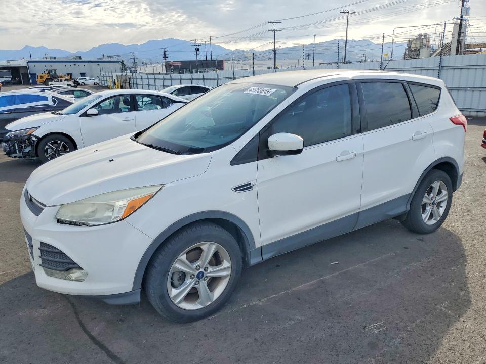 FORD ESCAPE 2014 with VIN 1FMCU0GX8EUC69914 - Photo from auction