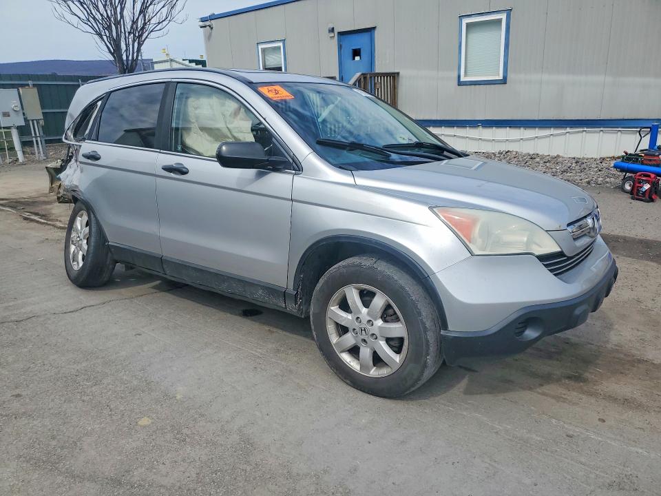 Photo 4 from auction – 2009 HONDA CR-V with VIN 5J6RE48559L010965