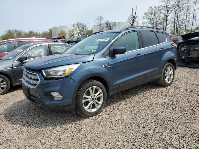 FORD ESCAPE SE 2018 with VIN 1FMCU9GD3JUB01912 - Photo from auction