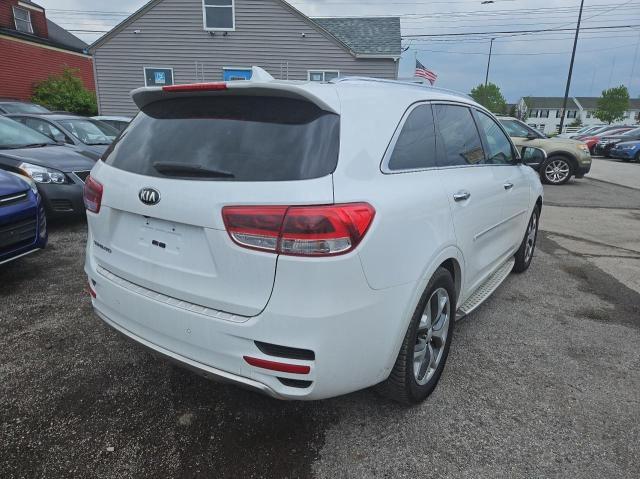 Photo 4 from auction – 2016 KIA SORENTO SX with VIN 5XYPK4A51GG100641