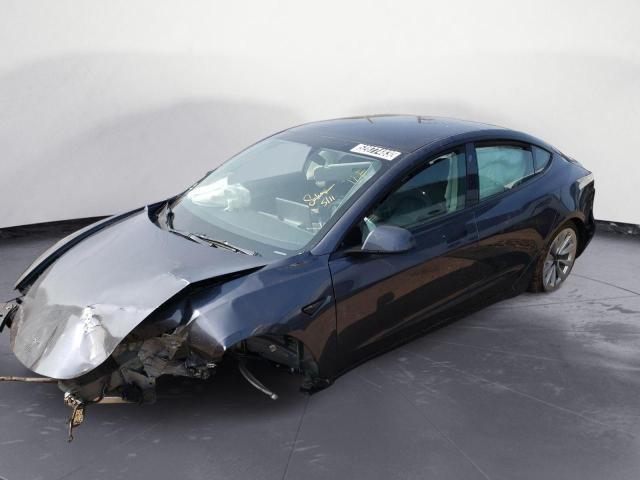 TESLA MODEL 3 2022 with VIN 5YJ3E1EAXNF285966 - Photo from auction