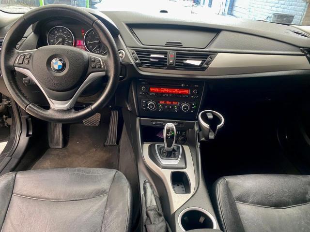 Photo 9 from auction – 2014 BMW X1 SDRIVE2 with VIN WBAVM1C55EVW47833