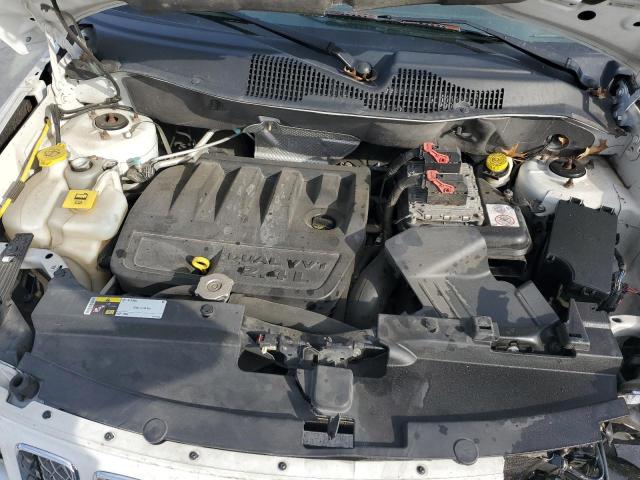 Photo 12 from auction – 2014 JEEP COMPASS LA with VIN 1C4NJCEB2ED660068