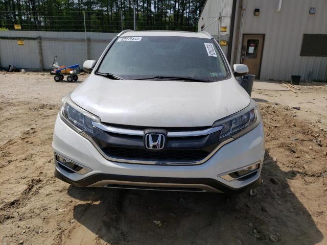 Photo 5 from auction – 2016 HONDA CR-V EXL with VIN 5J6RM4H73GL059700