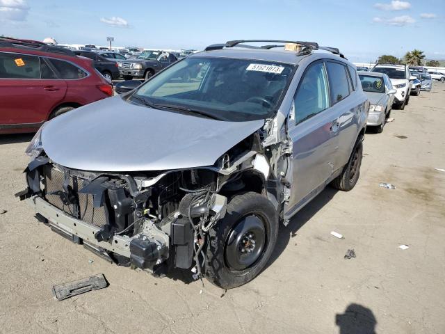 TOYOTA RAV4 LE 2018 with VIN 2T3ZFREV2JW425621 - Photo from auction