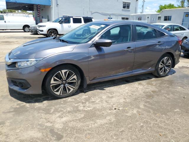 HONDA CIVIC EX 2016 with VIN 19XFC1F33GE028630 - Photo from auction