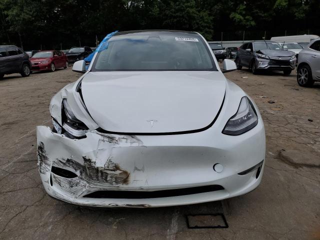 Photo 5 from auction – 2023 TESLA MODEL Y with VIN 7SAYGDEE3PA060909
