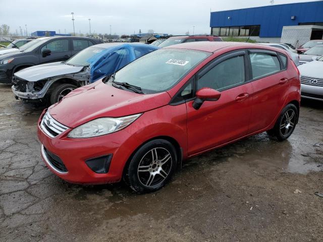 FORD FIESTA SE 2011 with VIN 3FADP4EJ0BM124832 - Photo from auction