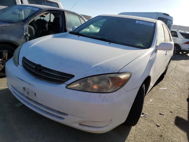 TOYOTA CAMRY LE 2002 with VIN 4T1BE32K42U080954 - Photo from auction