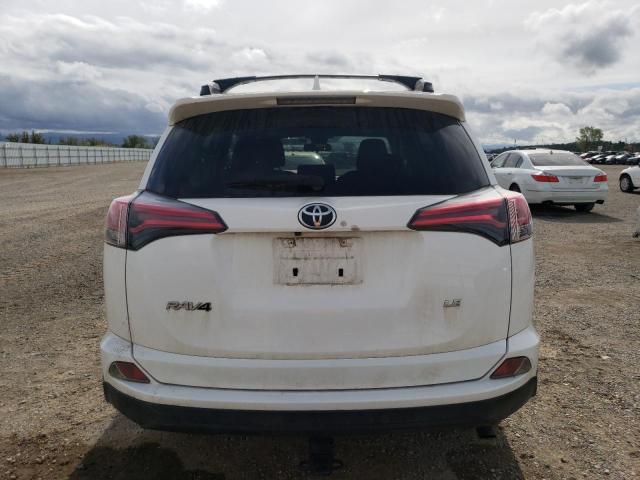 Photo 6 from auction – 2018 TOYOTA RAV4 LE with VIN JTMZFREV2JD129446