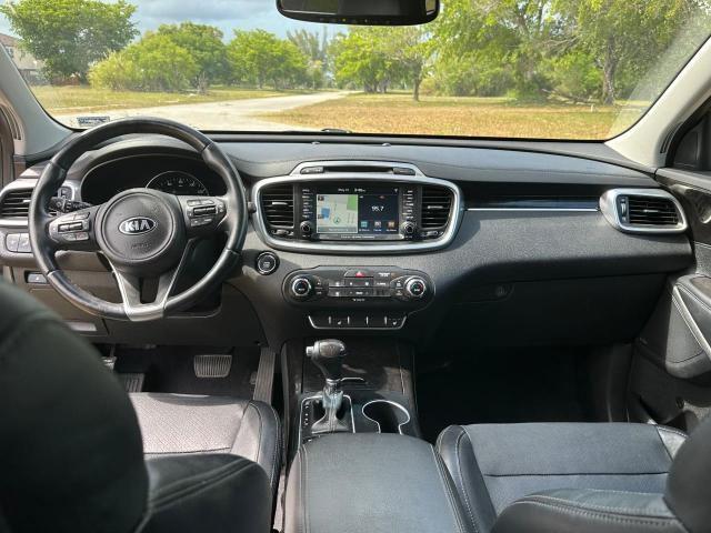 Photo 9 from auction – 2016 KIA SORENTO EX with VIN 5XYPH4A51GG089025