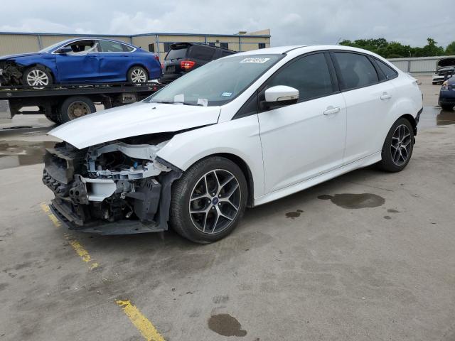 FORD FOCUS SE 2016 with VIN 1FADP3F29GL293581 - Photo from auction