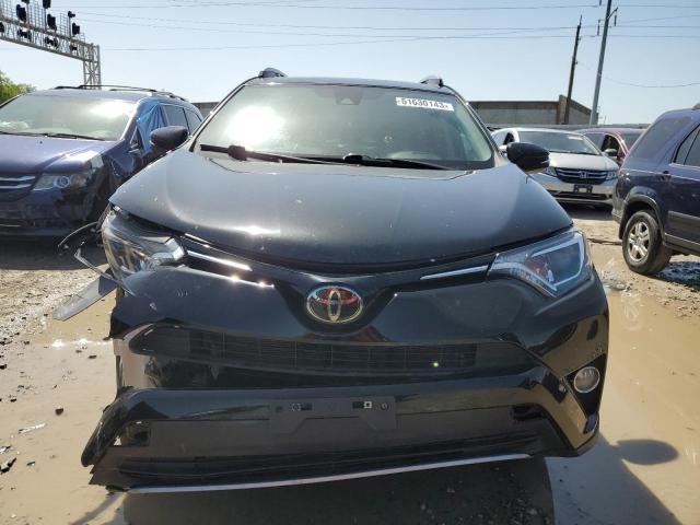 Photo 5 from auction – 2018 TOYOTA RAV4 with VIN 2T3RFREV1JW826075