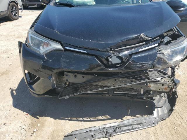 Photo 12 from auction – 2017 TOYOTA RAV4 XLE with VIN 2T3RFREV0HW686868
