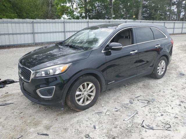 KIA SORENTO LX 2016 with VIN 5XYPGDA59GG024264 - Photo from auction