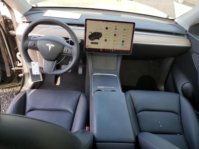 Photo 8 from auction – 2021 TESLA MODEL Y with VIN 5YJYGDEE6MF295820