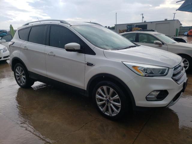 Photo 4 from auction – 2017 FORD ESCAPE TIT with VIN 1FMCU0J99HUD12218