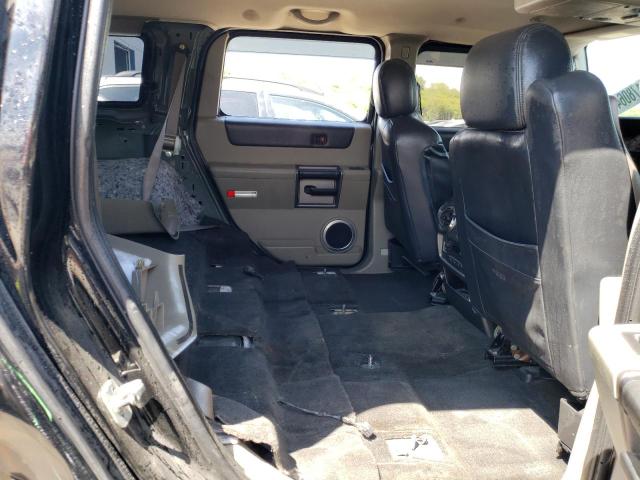 Photo 11 from auction – 2004 HUMMER H2 with VIN 5GRGN23U14H103430