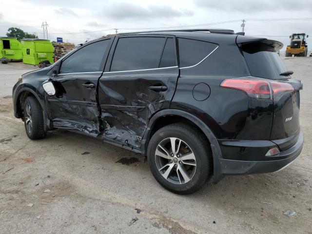Photo 2 from auction – 2016 TOYOTA RAV4 XLE with VIN 2T3RFREV4GW485800