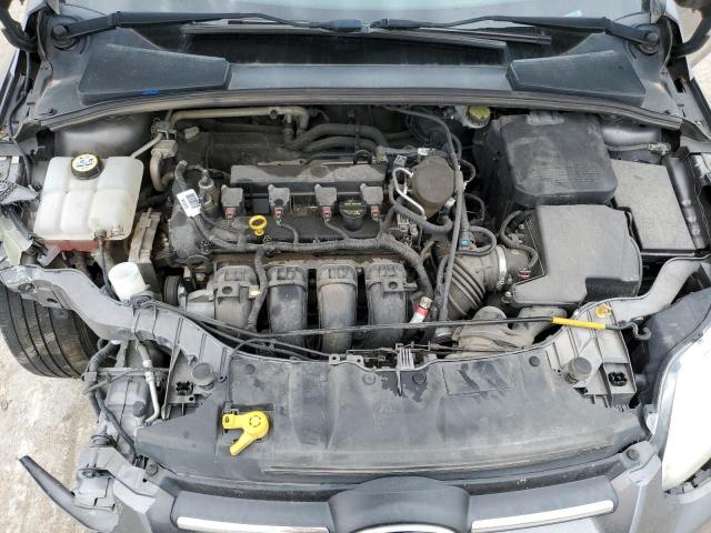 Photo 11 from auction – 2014 FORD FOCUS S with VIN 1FADP3E2XEL372952