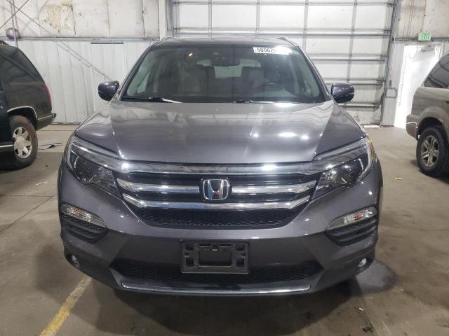 Photo 5 from auction – 2016 HONDA PILOT ELIT with VIN 5FNYF6H06GB008155