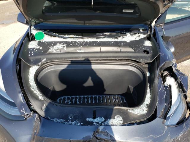 Photo 11 from auction – 2022 TESLA MODEL Y with VIN 7SAYGDEE2NF386085