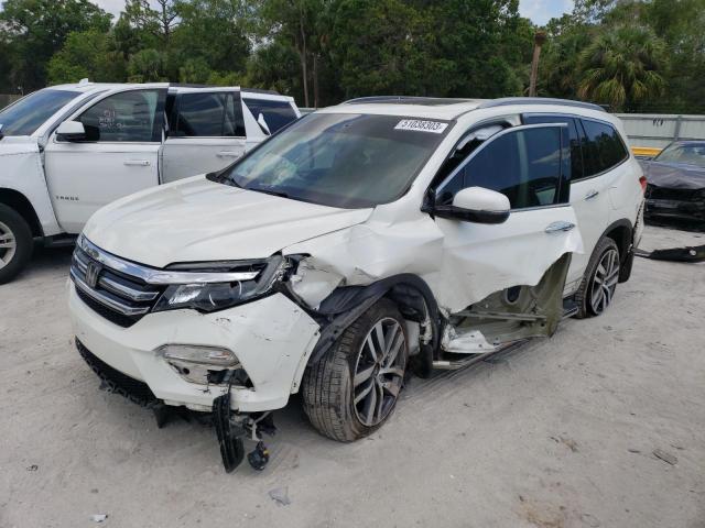 Photo 1 from auction – 2017 HONDA PILOT TOUR with VIN 5FNYF5H98HB037179