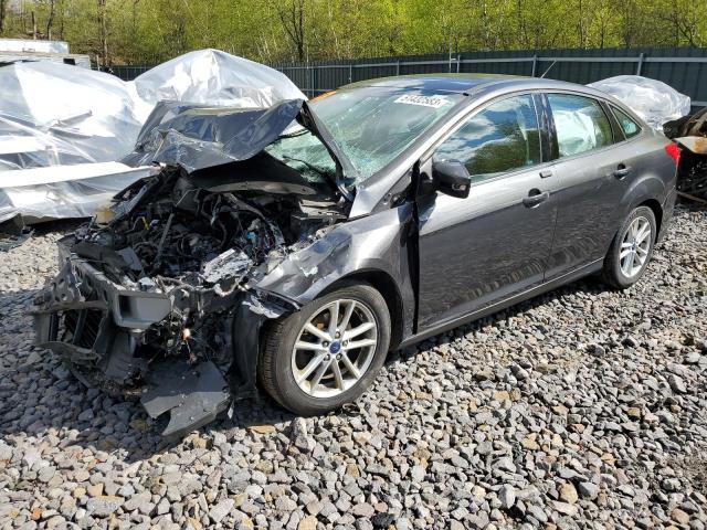 FORD FOCUS SE 2017 with VIN 1FADP3F24HL293831 - Photo from auction