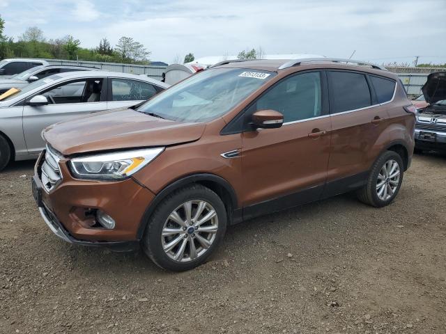 FORD ESCAPE TIT 2017 with VIN 1FMCU0J9XHUD86716 - Photo from auction