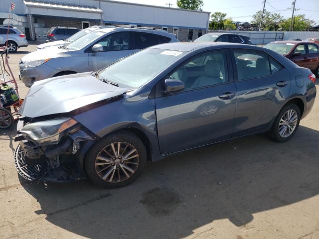TOYOTA COROLLA L 2014 with VIN 2T1BURHE0EC102817 - Photo from auction